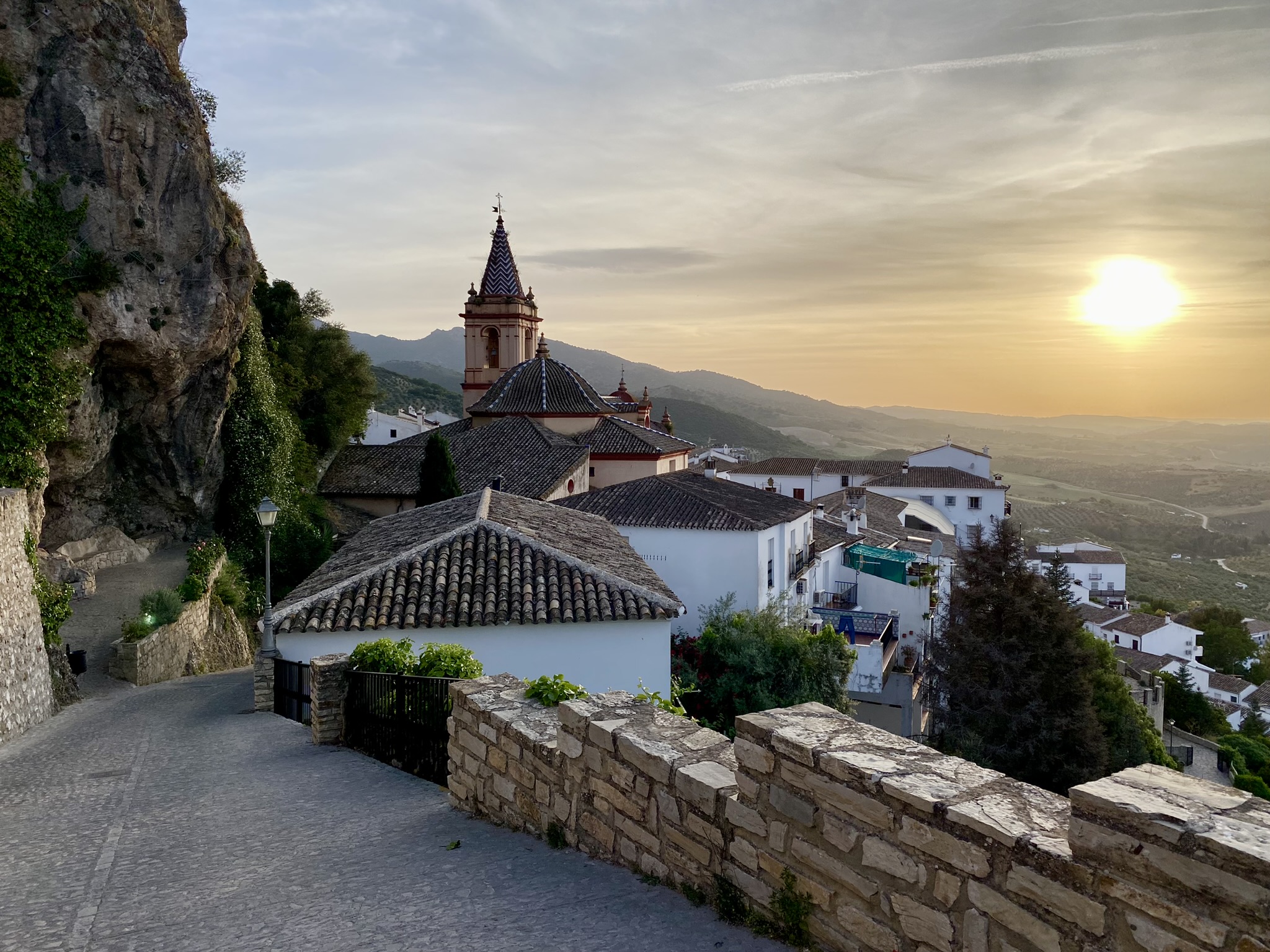 The church and white village at sunset